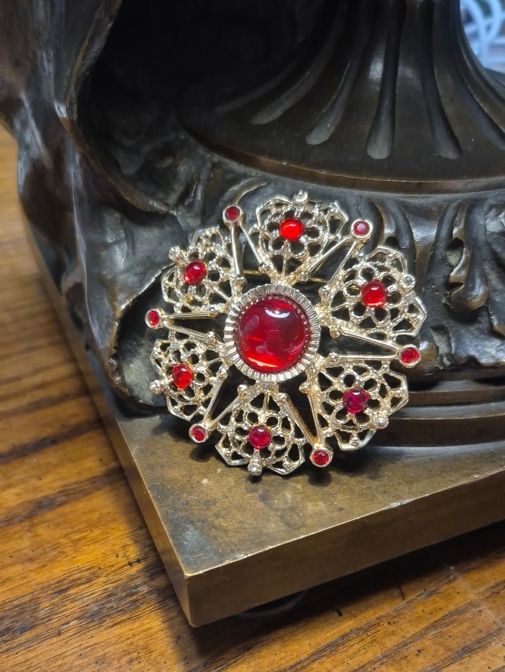 Sarah Coventry Vintage “Serenade” Gold Tone Filigree Red Rhinestone Brooch